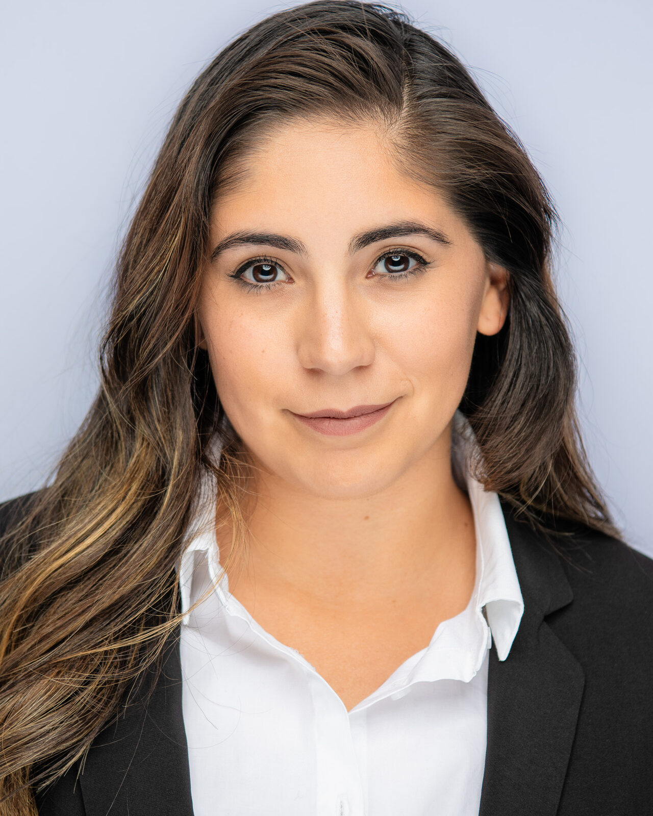 Actor headshot of Casandra in a blazer and white shirt